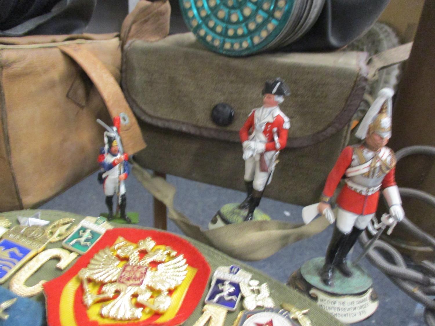 Military related items to include two gas masks, modern painted lead figures of soldiers, and a - Image 3 of 4