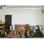 A large selection of contemporary Asian items to include two Indonesian style carved wooden plaques,