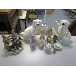 A group of German and other porcelain figurines to include a pair of Staffordshire dogs