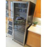 An electric wine fridge, 69" h x 23 1/4"w