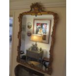 A gilt overmantle mirror with later plate, 57 1/2"h x 37 1/2"w