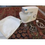 A 20th century Kenwood Chef classic food mixer in white with accessories and cover