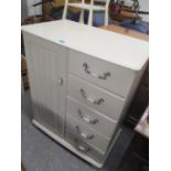 A modern cream chest of drawers, together with a matching dressing table