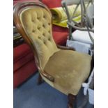 A Victorian spoon back salon chair