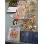 Mixed worldwide banknotes and coins, four Britain's First Decimal Coin packs, proof sets, and a