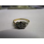 An 18ct gold and platinum diamond ring