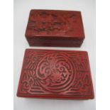 Two red Cinnabar boxes to include early 20th century Chinese example depicting figures in a