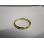 A 22ct gold wedding band