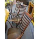 A set of six Ercol Goldsmith design dining chairs including two carvers