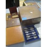 A mixed lot to include a cased set of silver teaspoons, a miniature chess set, and mixed books