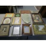 A group of prints, an early 19th century rosewood veneered picture frame, an oval wall mirror, and a