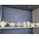 Seven Victoria & Albert Museum porcelain teapots