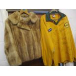 An Australian rugby signed shirt together with a fur jacket