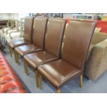 Four contemporary dining chairs having brown faux seats Location: C