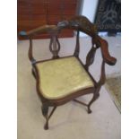 An Edwardian corner bedroom chair and a nest of three tables