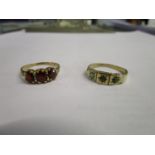 A 9ct gold and turquoise ring and a three-stone 9ct gold garnet ring