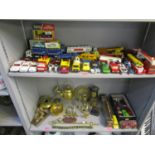 A mixed lot of diecast model toys to include a boxed Dinky Toys Ford Panda Police car model 270, a