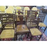 A set of four Georgian mahogany dining chairs, together with a set of six ladder back rush seated