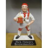 A Carlton Ware 'Pick Flowers Brewmaster' advertising figure 9 1/2"h