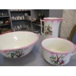 A New Hall early 20th century jug and bowl set with matching chamber pot having a white ground