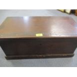 A 19th century stained pine box with an iron drop handle