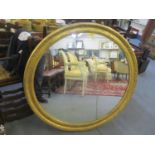 A large reproduction circular gilt wall hanging mirror 43 1/4"d