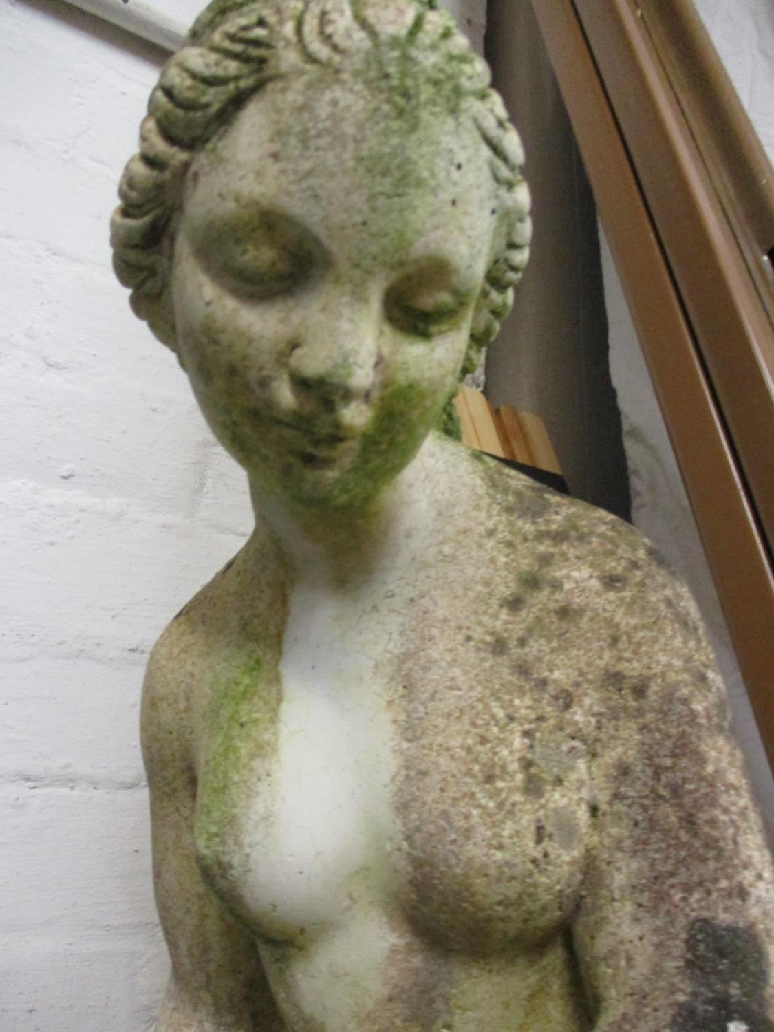 A composition stone figure of a female on a plinth. Location:G - Image 2 of 2