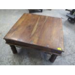 A mango wood coffee table