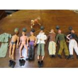 Seven Action Man dolls 1960's - 1990's A/F, together with a model of the Action Man Husky guard