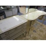 A mid 20th century cream painted French style kidney shaped dressing table, together with two