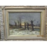 A small oil on board of a Dutch village scene with snow on the ground, signed indistinctly to the