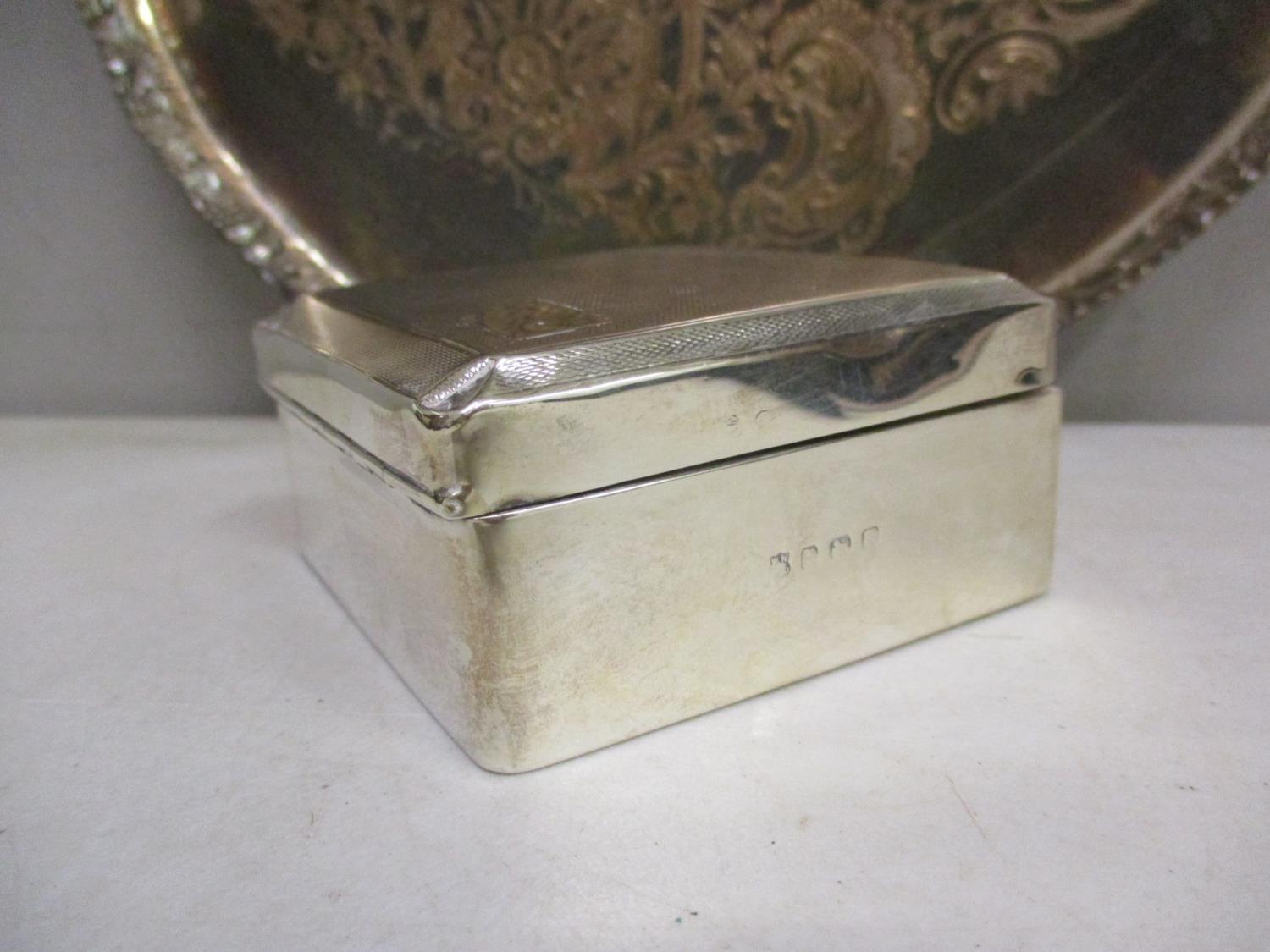 A silver cigarette box 3 1/2" x 3 1/2", total weight 247.75g, together with a silver plated and - Image 2 of 4