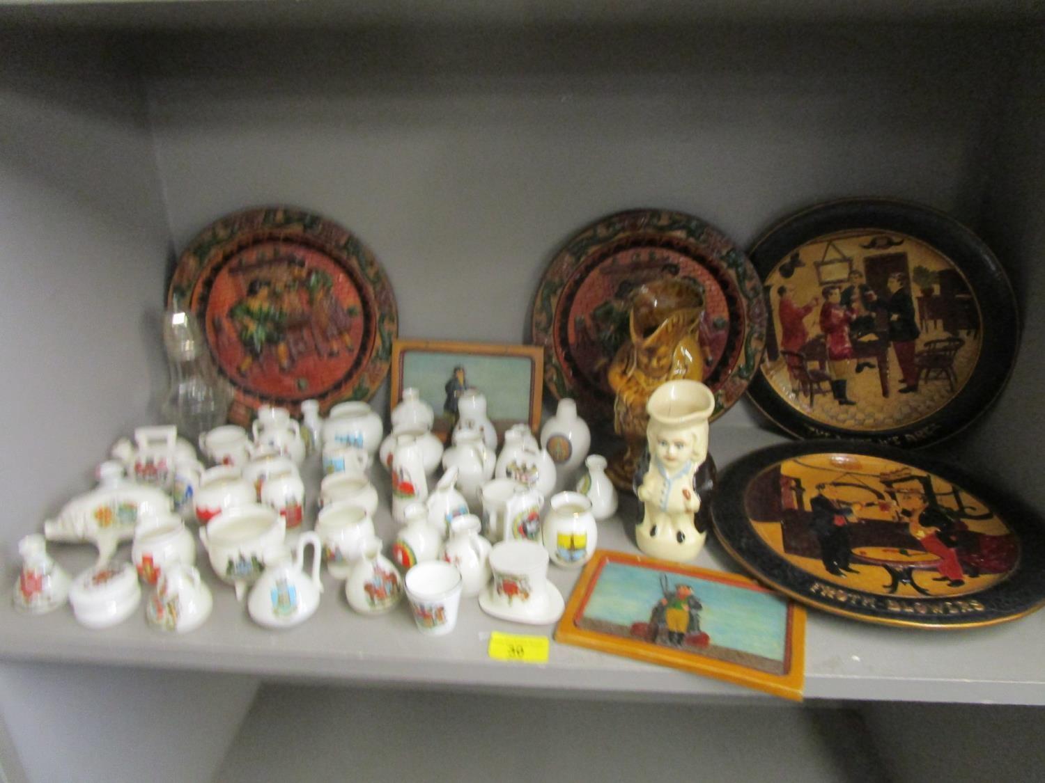 A mixed lot of ceramics to include Bretty wall plaques, crested china including Goss, and a silver