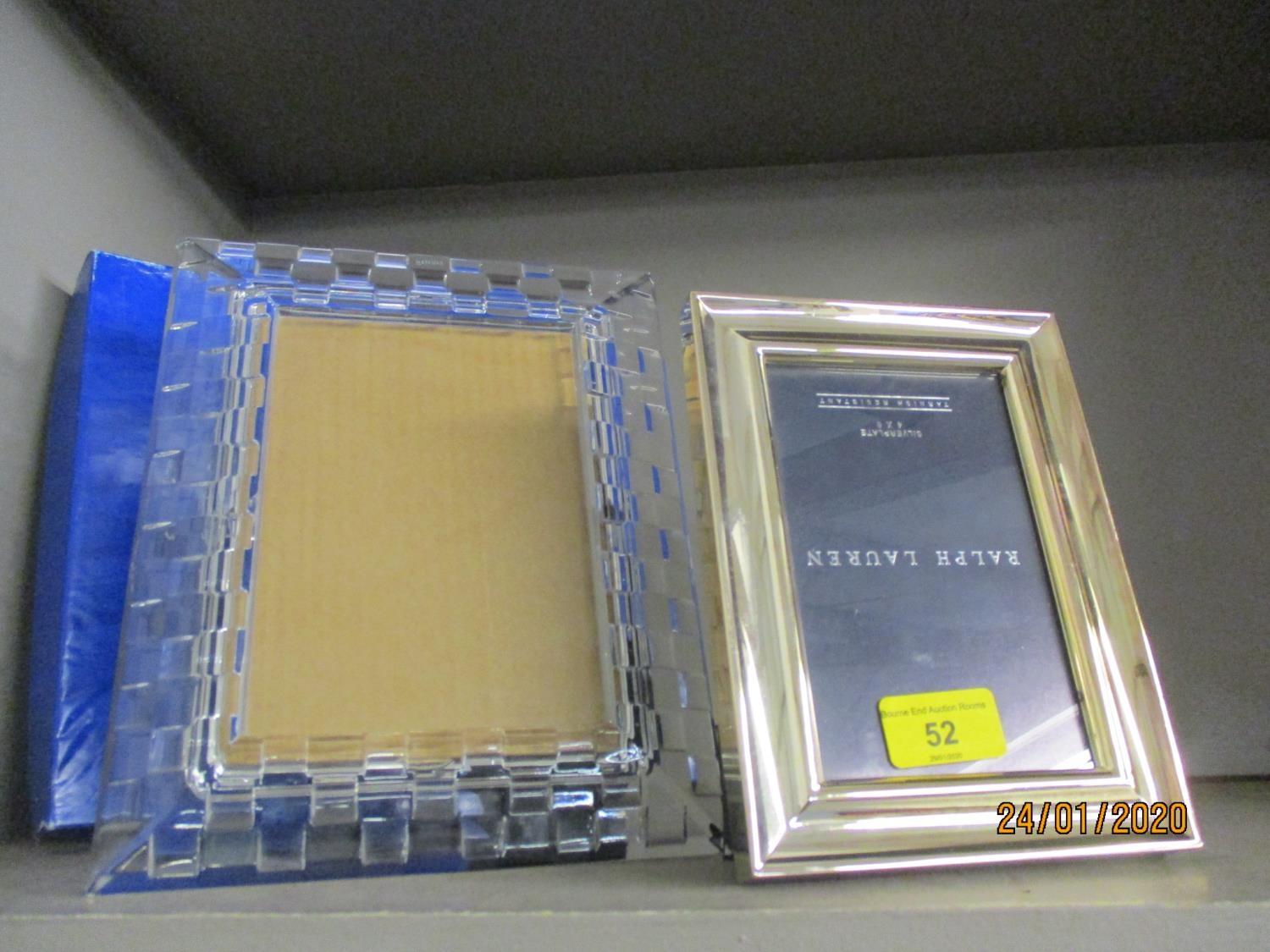 A Stuart crystal picture frame and a Ralph Lauren silver plated frame