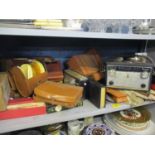 A vintage lot comprising gents driving gloves, a gents vanity set, a hip flask, a book rest with