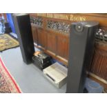 A pair of contemporary and tall Mordaunt-Short speakers in black ash