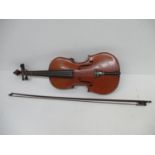 A late 19th century violin with a two piece back and inlaid edge, the tail piece inlaid with