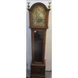 LOT WITHDRAWN - An early 20th century oak cased longcase clock. The arched top dial having a matted