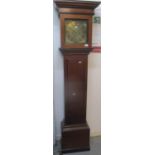 A Georgian oak cased 8 day longcase clock. The dial having gilt metal spandrels, Roman numerals