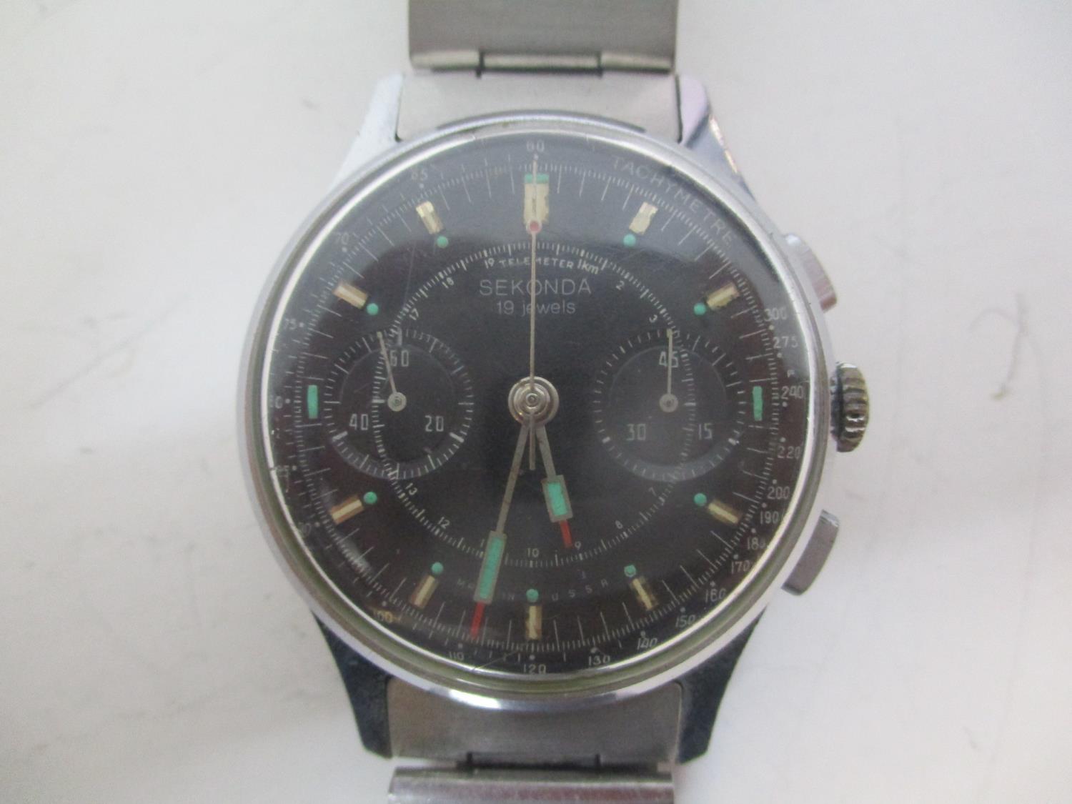 A Sekonda USSR gents stainless steel, manual wind chronograph wristwatch. The black dial inscribed