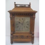 LOT WITHDRAWN - Late 19th century oak cased mantle clock having a silvered dial with Roman numerals