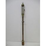 LOT WITHDRAWN - A 20th century brass cased marine stick barometer with a silvered dial