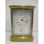 A late 19th/early 20th century Victor Reclus French alarm carriage clock. The white enamel dial