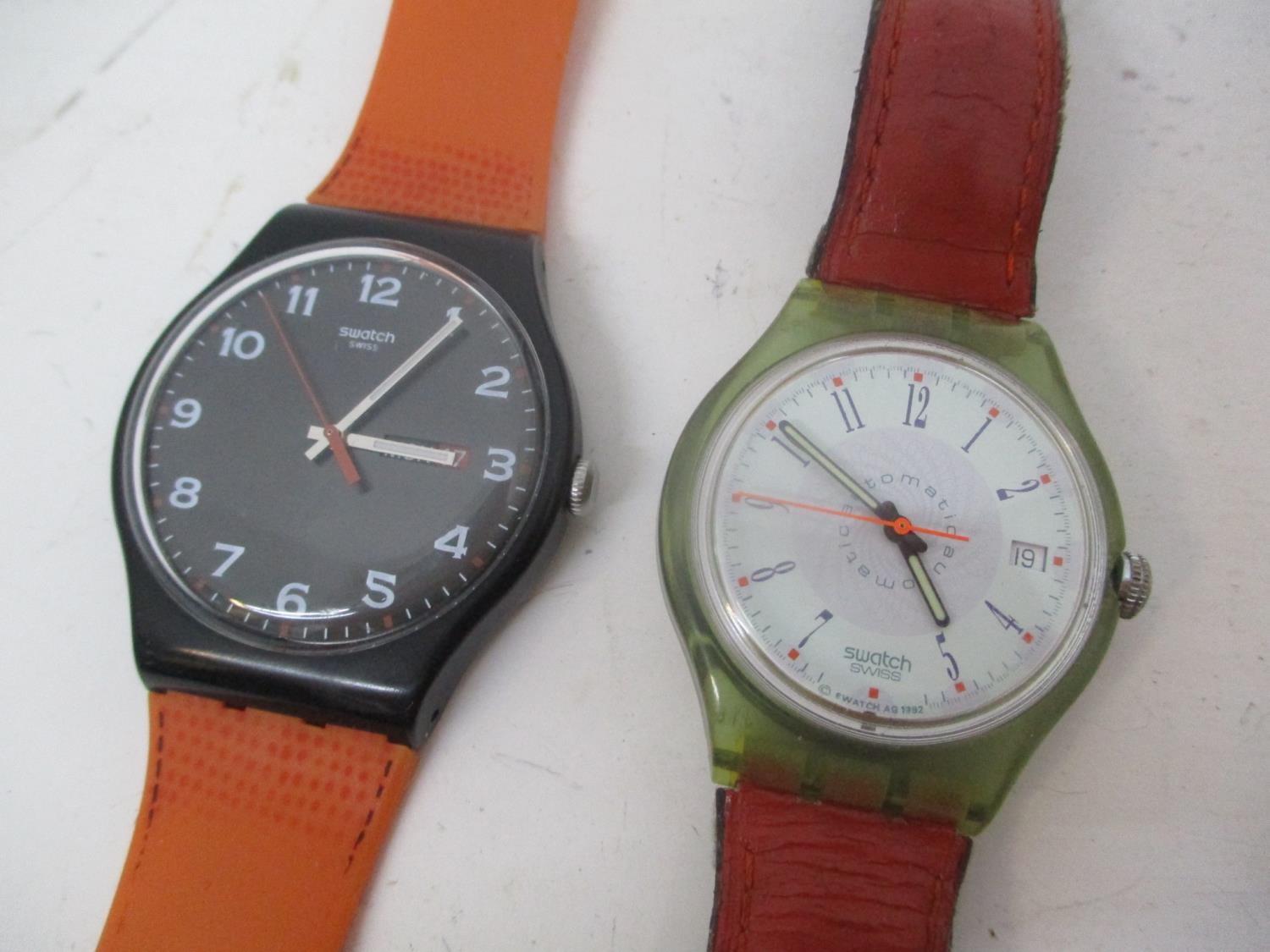 Two Swatch gents wristwatches to include one having an automatic 23-jewel visual movement, the other