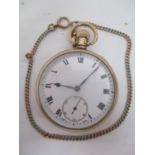 An early 20th century 9ct gold, open face, keyless wound pocket watch. The white enamel dial