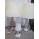 A 1960s alabaster Spanish chalice formed lamp, together with two marble table lamps, PAT tested