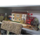 A mixed lot to include a dolls house with furniture, miniature sewing machine, carved oak panel,