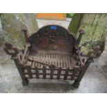 A late 19th/early 20th century cast iron fire grate