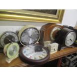 A selection of clocks to include Smiths electric and mechanical examples and others