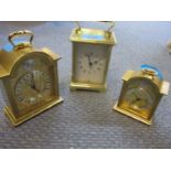 Three modern carriage clocks to include a Bayard 8 day carriage clock